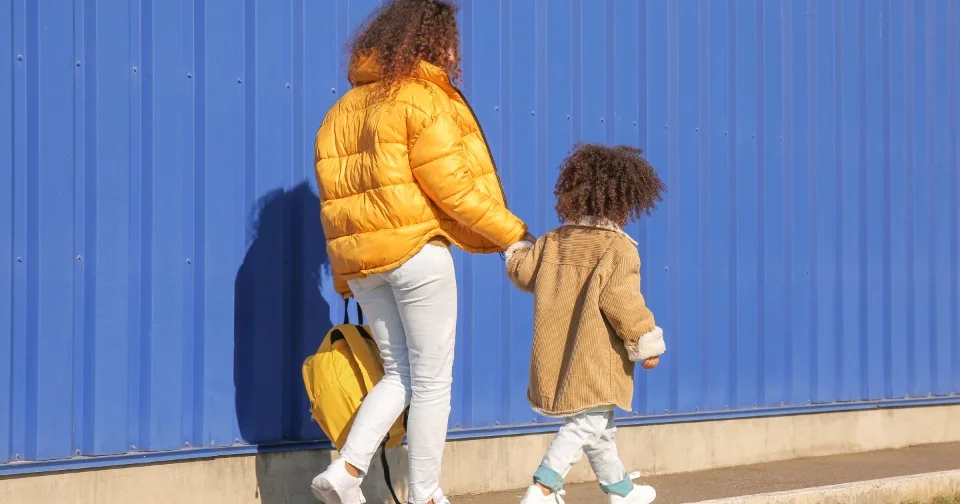 NDIS Eligibility: Who Qualifies and How to Apply (2026 Guide) A mother and daughter holding hands — NDIS eligibility explained in plain English for Australian families